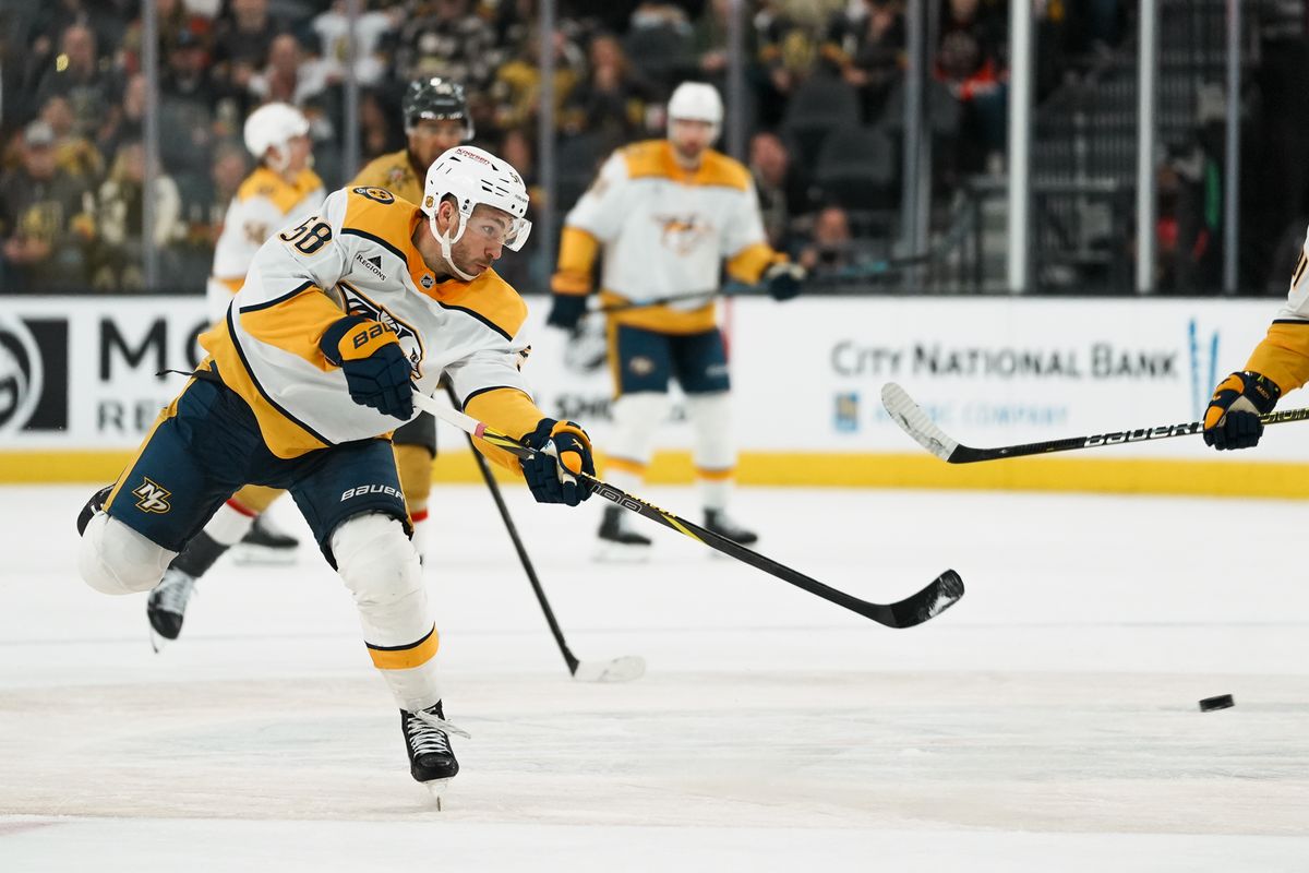 Nashville Predators defenseman left wing Michael Bunting (58) shoots the puck during third period of NHL game against Vegas Golden Knights on Saturday Jan. 17, 2026 at T-Mobile Arena in Las Vegas.