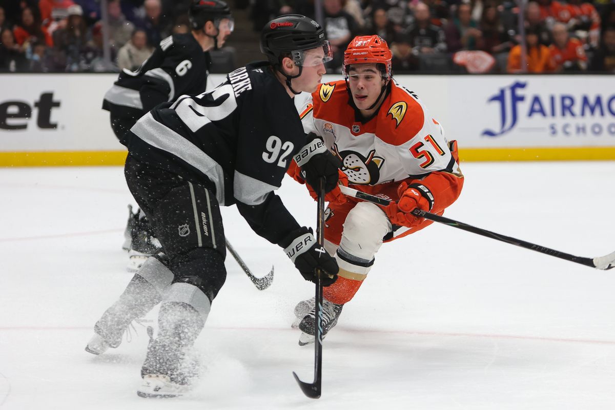 Los Angeles Kings defenseman Brandt Clarke (92) and Anaheim Ducks defenseman Olen Zellweger (51) collide during an NHL game on January 17, 2026 in Anaheim, CA. Los Angeles Kings defenseman Brandt Clarke (92) and Anaheim Ducks defenseman Olen Zellweger (51) collide during an NHL game on January 17, 2026 in Anaheim, CA.