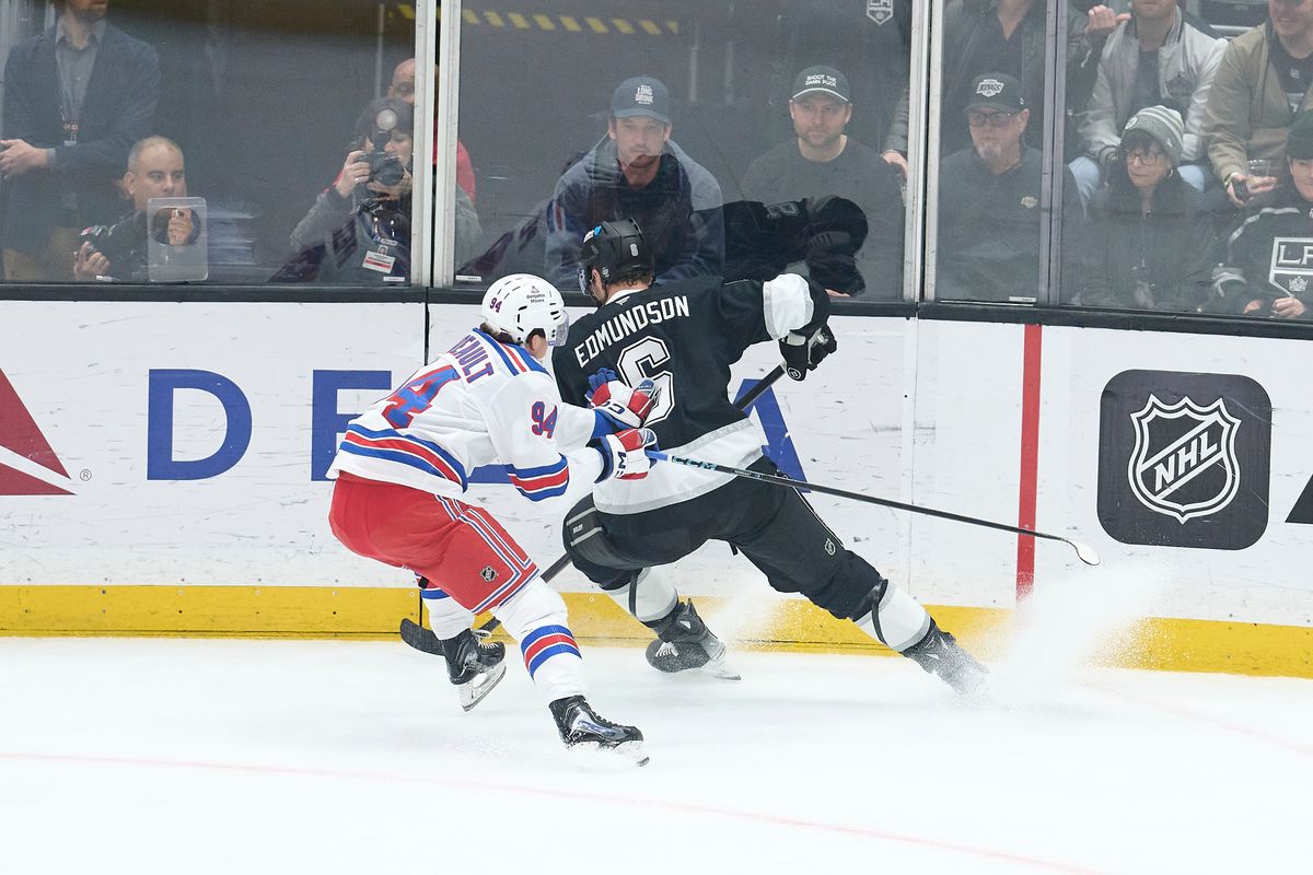 The Los Angeles Kings defender Joel Edmundson (6) gains possession against the New York Rangers at the Crypto Arena on January 20th, 2026 in Los Angeles California. The Los Angeles Kings defender Joel Edmundson (6) gains possession against the New York Rangers at the Crypto Arena on January 20th, 2026 in Los Angeles California.