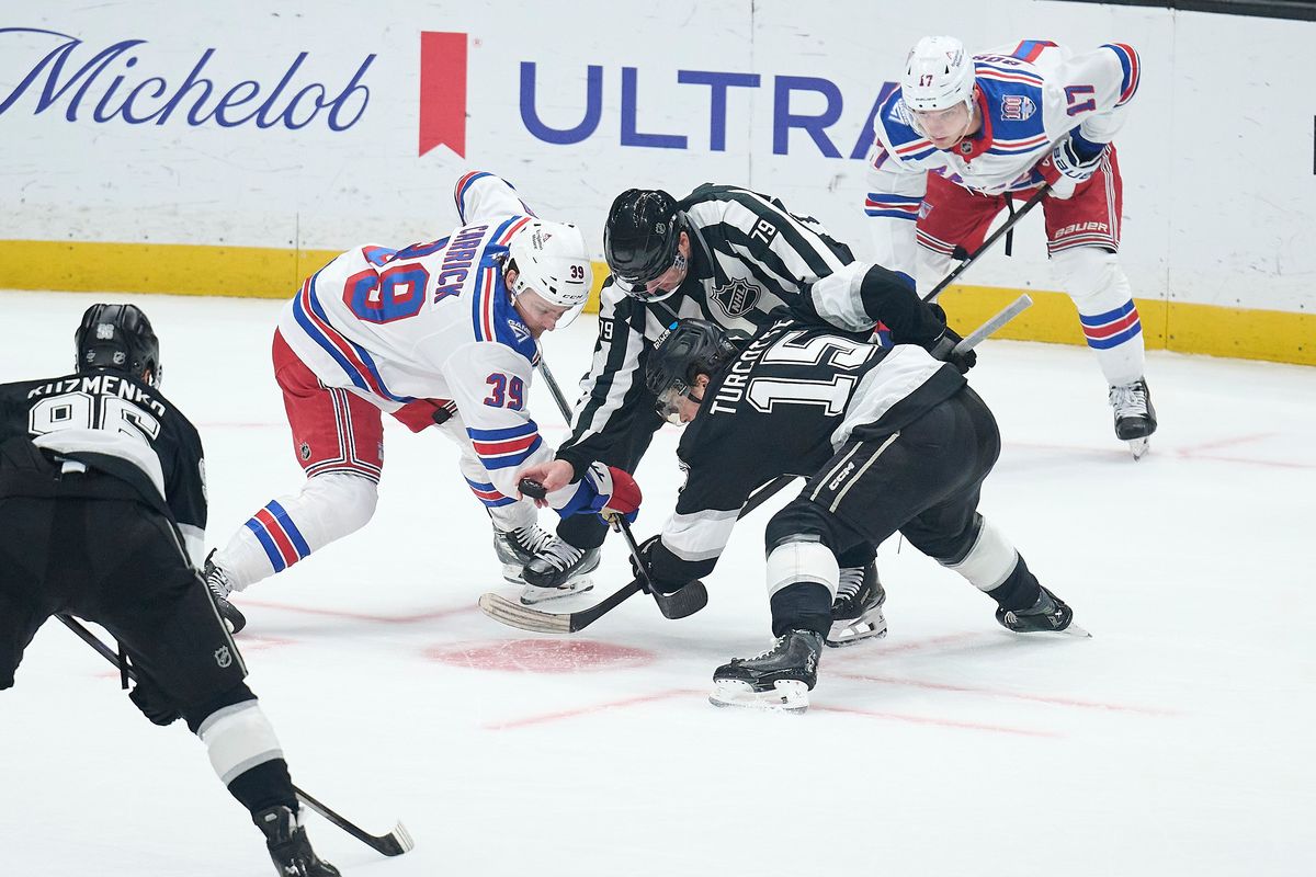 The Los Angeles Kings center Alex Turcotte (15) does a face off against the New York Rangers at the Crypto Arena on January 20th, 2026 in Los Angeles California. The Los Angeles Kings center Alex Turcotte (15) does a face off against the New York Rangers at the Crypto Arena on January 20th, 2026 in Los Angeles California.
