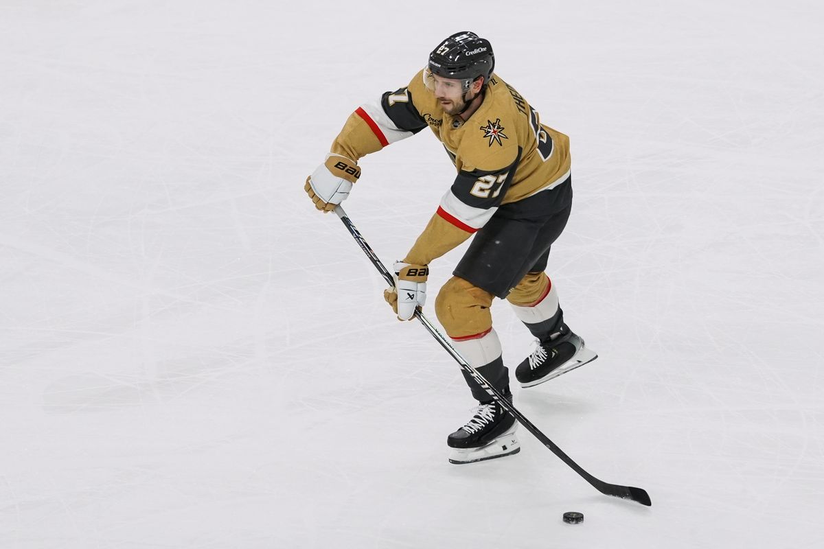 Golden Knights defenseman Shea Theodore (27) passes the puck down the ice during first period of NHL game against Dallas Stars on Thursday Jan. 29, 2026 at T-Mobile Arena in Las Vegas.