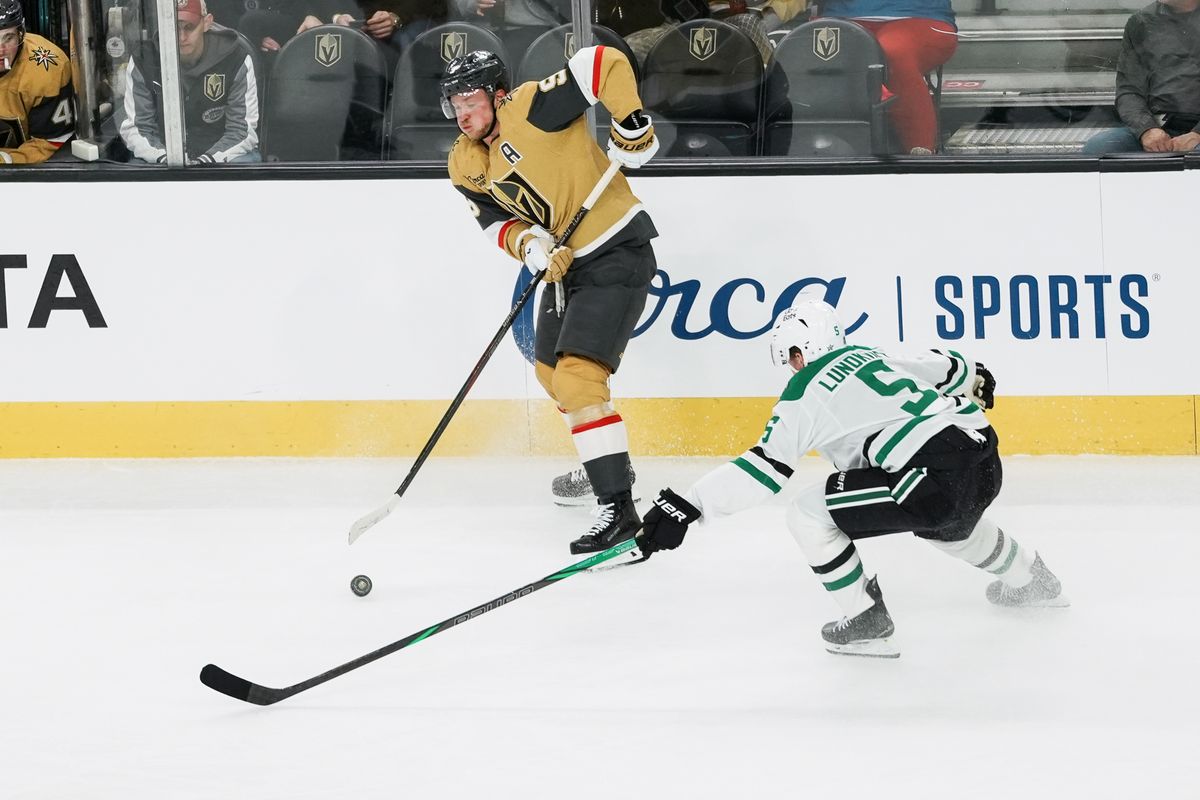 Golden Knights center Jack Eichel (9) pass the puck while Stars defensemen Nils Lundkvist (5) attempts to block the pass during second period of NHL game against Dallas Stars on Thursday Jan. 29, 2026 at T-Mobile Arena in Las Vegas.
