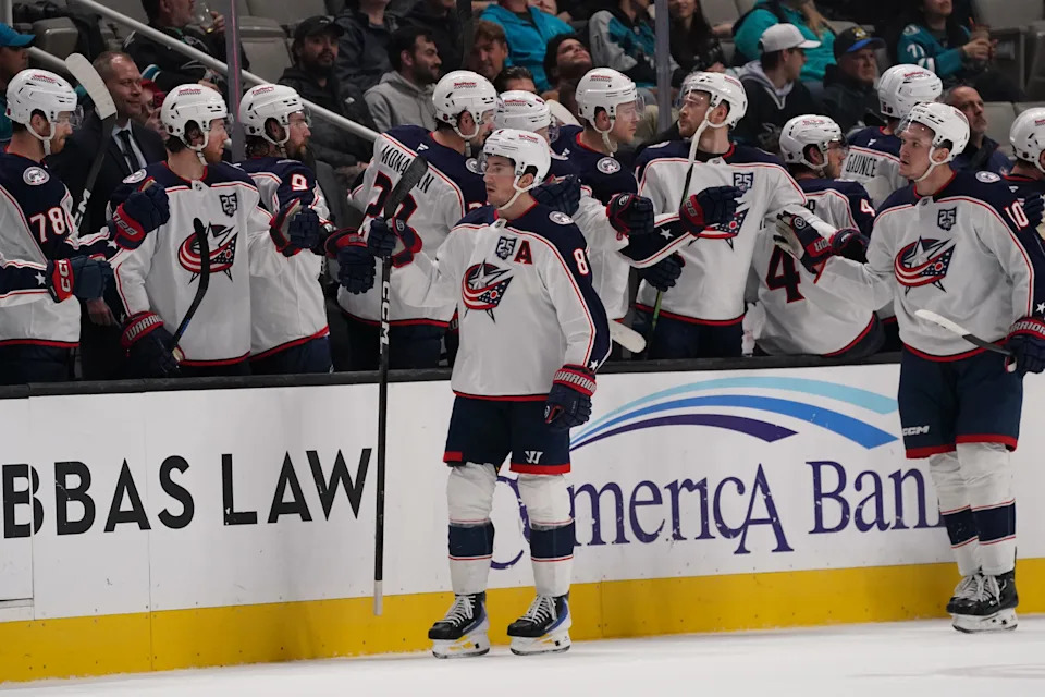 Jan 6, 2026; San Jose, California, USA; Columbus Blue Jackets defenseman Zach Werenski (8) celebrates with the bench after scoring a goal in the second period at SAP Center at San Jose. Mandatory Credit: David Gonzales-Imagn Images