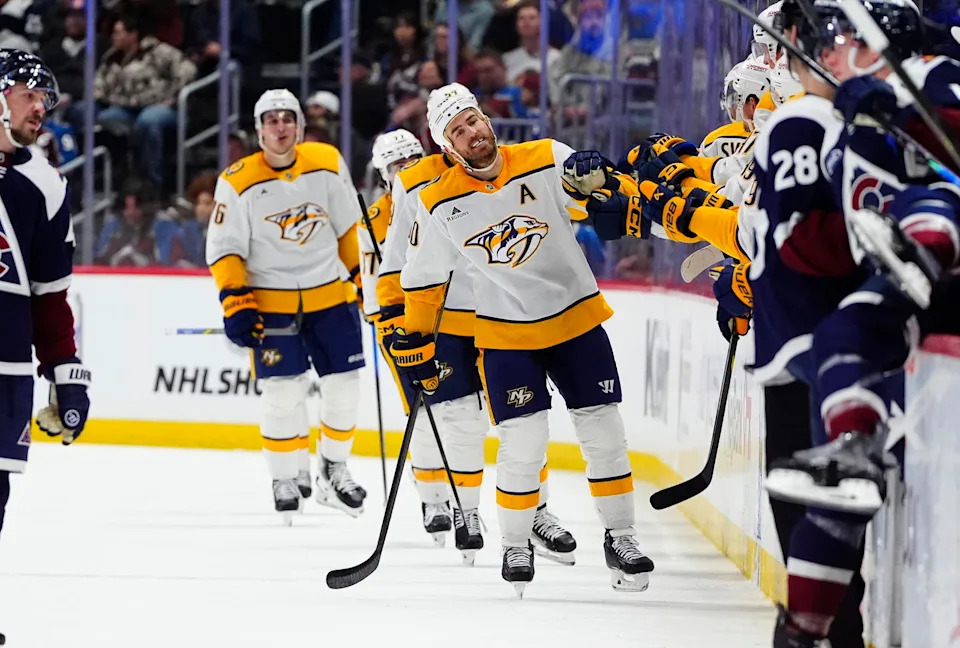 Jan 16, 2026; Denver, Colorado, USA; Nashville Predators center Ryan O'Reilly (90) celebrates his hat trick goal in the second period against the Colorado Avalanche at Ball Arena. Mandatory Credit: Ron Chenoy-Imagn Images