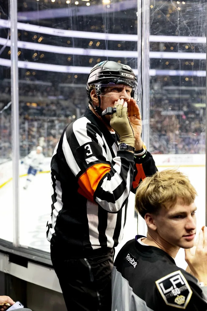 Ferrell joked about the two referees, claiming that he helped teach them. NHLI via Getty Images