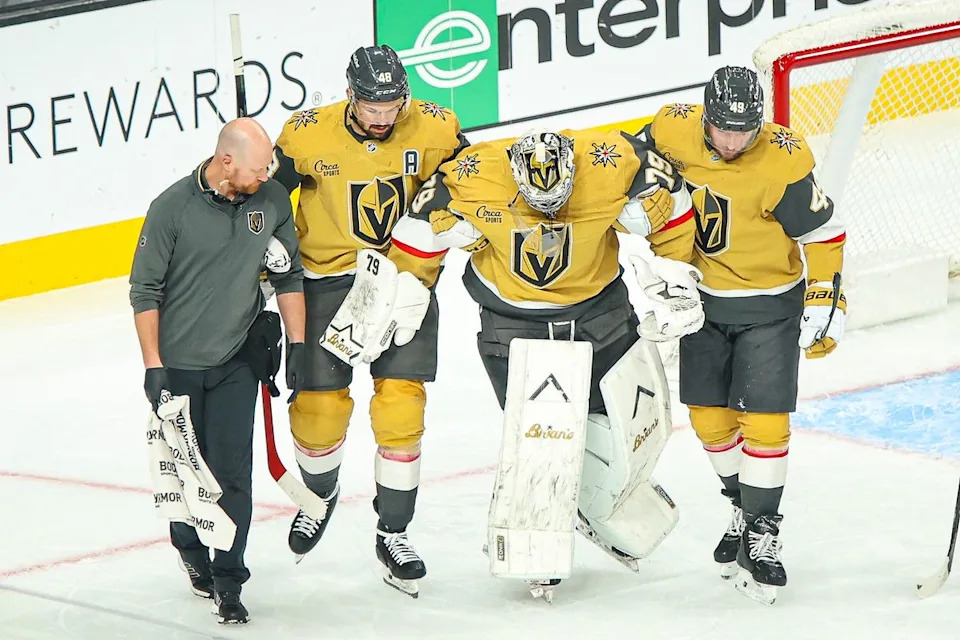 Vegas Golden Knights G Carter Hart (79) skates off with assistance from his teammates after sustaining an injury on Thursday January 8, 2026, in Las Vegas, Nevada.