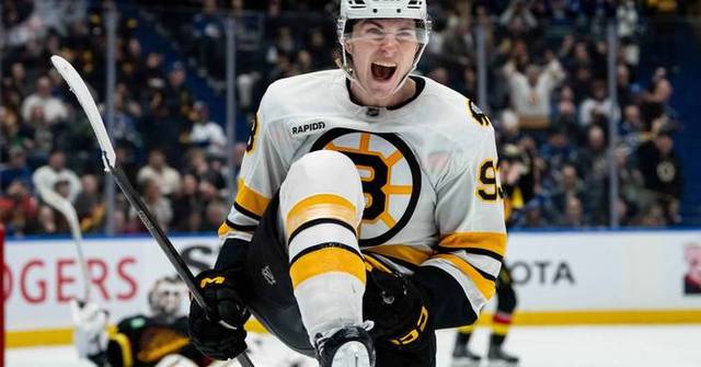 Minten scores twice in huge homecoming to lift Bruins over Canucks 3-2 in OT