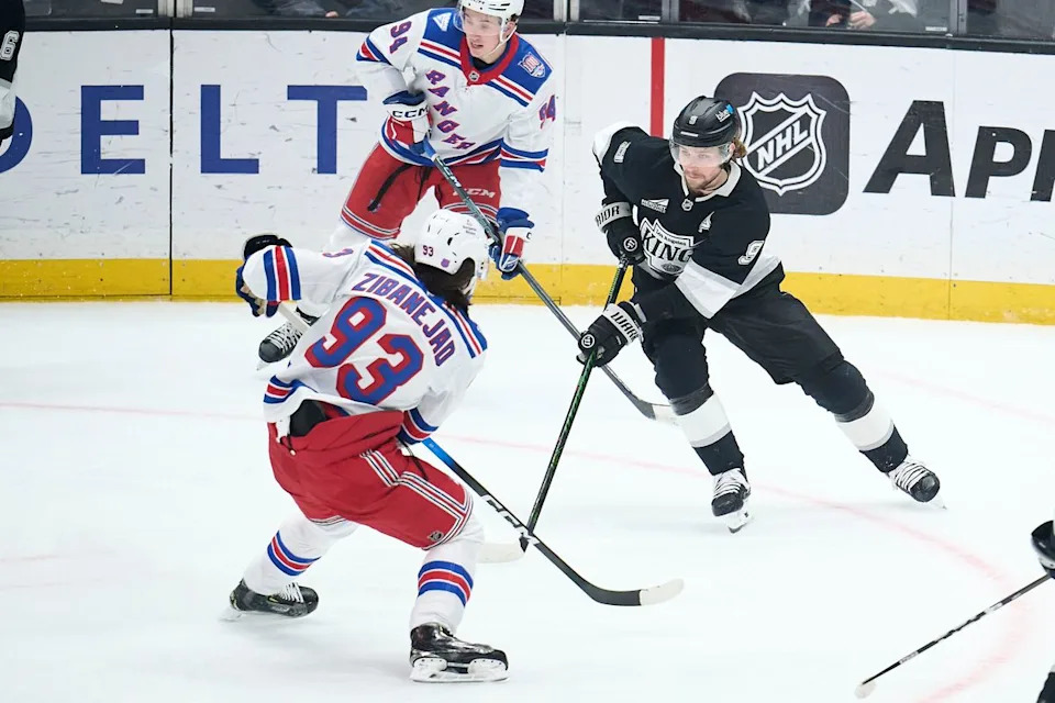 The Los Angeles Kings right wing Adrian Kempe (9) clears the puck against the New York Rangers at the Crypto Arena on January 20th, 2026 in Los Angeles California.