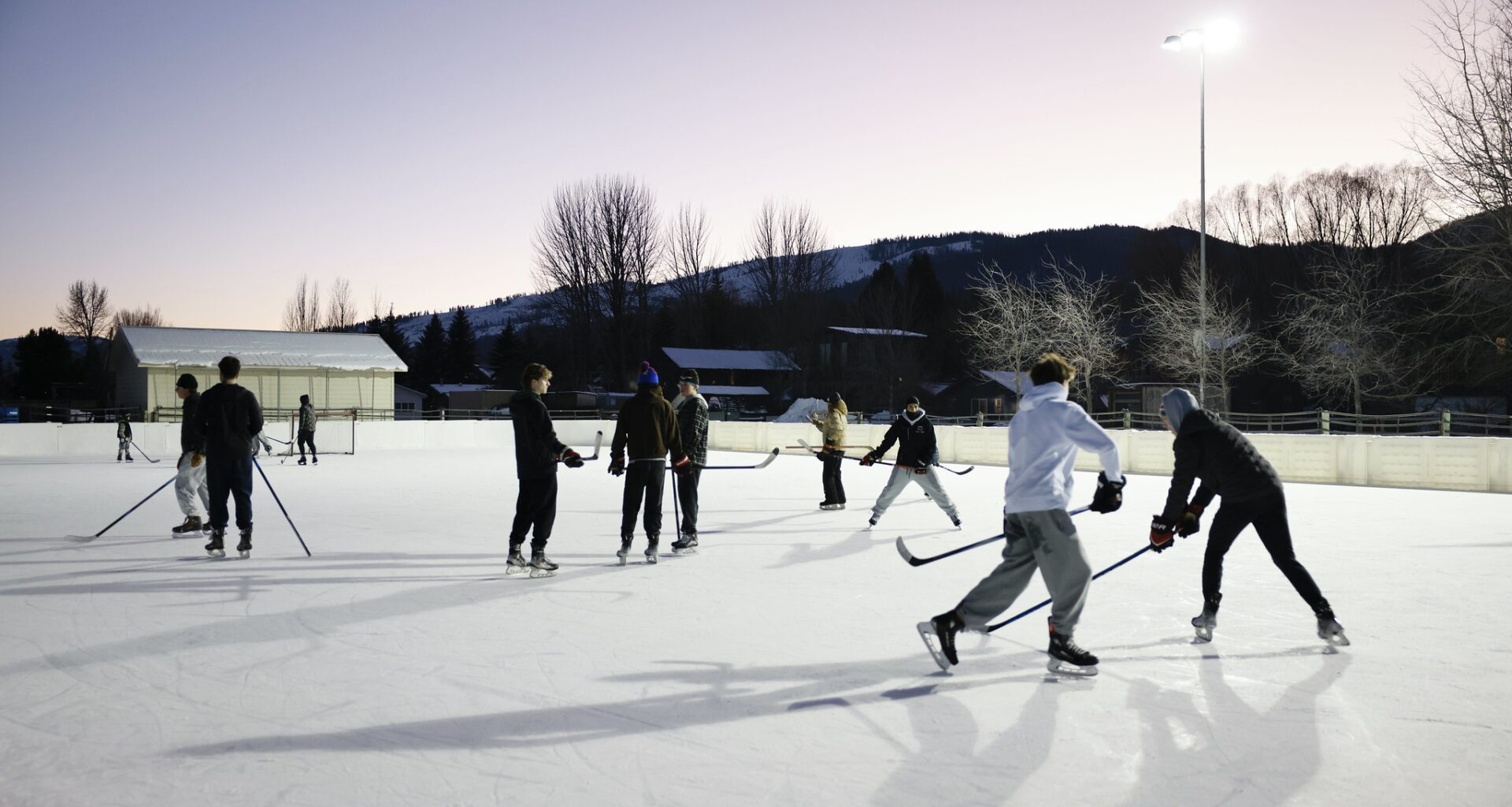 Hockey players glide across newly opened Owen Bircher rink