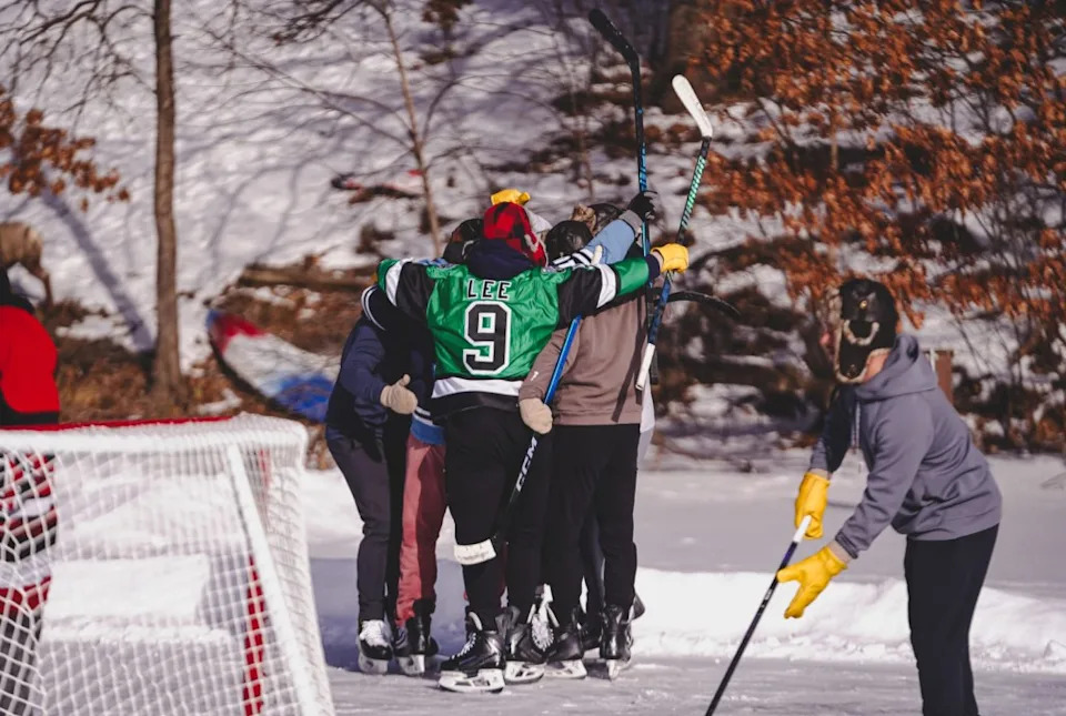 Some Islanders celebrate while skating on a pond in Minnesota. Tyler Brosious/New York Islanders