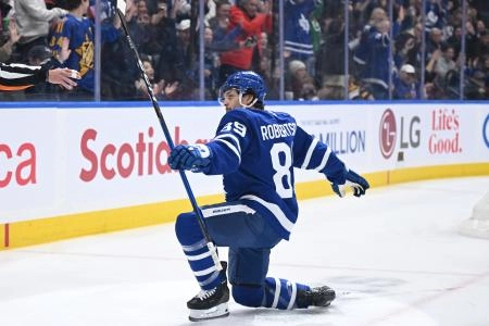 Nov 8, 2025; Toronto, Ontario, CAN; Toronto Maple Leafs forward Nick Robertson (89) celebrates after scoring a goal against the Boston Bruins in the first period at Scotiabank Arena. Mandatory Credit: Dan Hamilton-Imagn Images
