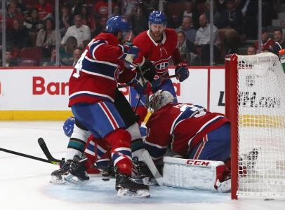Oct 24, 2019; Montreal, Quebec, CAN; Montreal Canadiens goaltender Carey Price (31) makes a save against San Jose Sharks right wing Kevin Labanc (62) as defenseman Ben Chiarot (8) and defenseman Jeff Petry (26) and center Nate Thompson (44) defend during the first period at Bell Centre. Mandatory Credit: Jean-Yves Ahern-Imagn Images