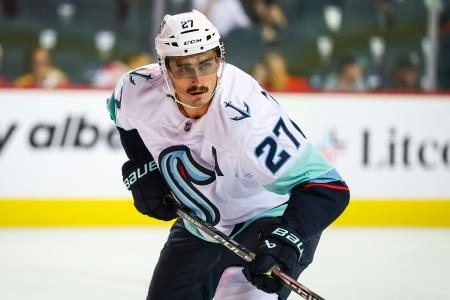 Sep 23, 2025; Calgary, Alberta, CAN; Seattle Kraken left wing Mason Marchment (27) skates against the Calgary Flames during the first period at Scotiabank Saddledome