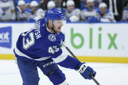 Dec 22, 2025; Tampa, Florida, USA; Tampa Bay Lightning defenseman Darren Raddysh (43) shoots the puck against the St. Louis Blues in the first period at Benchmark International Arena. Mandatory Credit: Nathan Ray Seebeck-Imagn Images