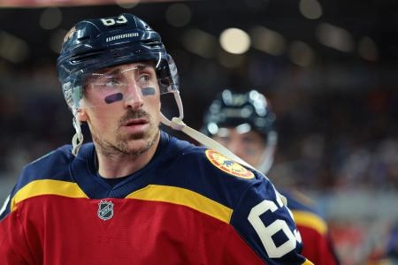 Jan 2, 2026; Miami, Florida, USA; Florida Panthers left wing Brad Marchand (63) looks on prior to the third period in the 2026 Winter Classic ice hockey game against the New York Rangers at loanDepot Park. Mandatory Credit: Sam Navarro-Imagn Images