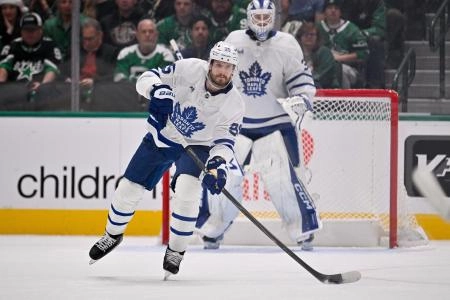Dec 21, 2025; Dallas, Texas, USA; Toronto Maple Leafs defenseman Oliver Ekman-Larsson (95) skates against the Dallas Stars during the game at the American Airlines Center. Dec 21, 2025; Dallas, Texas, USA; Toronto Maple Leafs defenseman Oliver Ekman-Larsson (95) skates against the Dallas Stars during the game at the American Airlines Center.