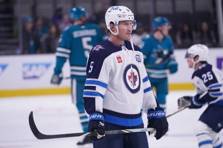 Nov 7, 2025; San Jose, California, USA; Winnipeg Jets defenseman Luke Schenn (5) warms up before facing the San Jose Sharks at SAP Center at San Jose. Mandatory Credit: David Gonzales-Imagn Images