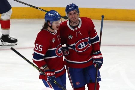 Apr 29, 2022; Montreal, Quebec, CAN; Montreal Canadiens center Tyler Pitlick (24) celebrates his goal against Florida Panthers with left wing Michael Pezzetta (55) during the third period at Bell Centre. Mandatory Credit: Jean-Yves Ahern-Imagn Images