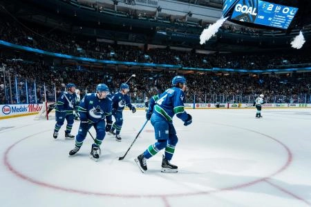 Jan 2, 2026; Vancouver, British Columbia, CAN; Vancouver Canucks forward Brock Boeser (6) and forward Kiefer Sherwood (44) and forward Elias Pettersson (40) and forward Jake DeBrusk (74) celebrate Sherwood's goal against the Seattle Kraken in the second period at Rogers Arena.