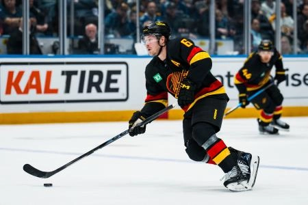 Jan 3, 2026; Vancouver, British Columbia, CAN; Vancouver Canucks forward Brock Boeser (6) handles the puck against the Boston Bruins in the third period at Rogers Arena.