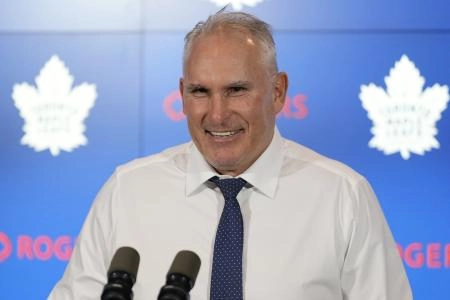 Dec 2, 2024; Toronto, Ontario, CAN; Toronto Maple Leafs head coach Craig Berube smiles during a press conference after a win over the Chicago Blackhawks at Scotiabank Arena. Mandatory Credit: John E. Sokolowski-Imagn Images