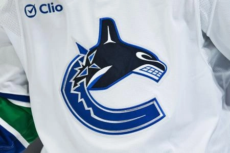 Jan 12, 2026; Montreal, Quebec, CAN; View of a Vancouver Canucks logo on a jersey worn by a member of the team during the second period at Bell Centre.