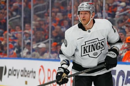 Jan 10, 2026; Edmonton, Alberta, CAN; Los Angeles Kings forward Corey Perry (10) looks for a loose puck against Edmonton Oilers at Rogers Place. Mandatory Credit: Perry Nelson-Imagn Images