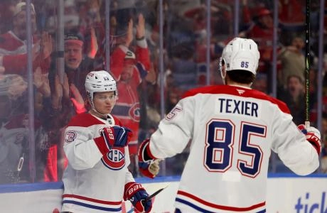 Jan 15, 2026; Buffalo, New York, USA; Montréal Canadiens right wing Cole Caufield (13) reacts after scoring a goal during the first period against the Buffalo Sabres at KeyBank Center. Mandatory Credit: Timothy T. Ludwig-Imagn Images