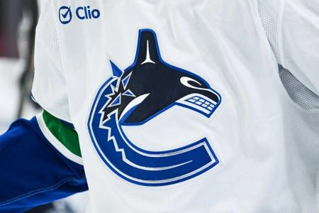 Jan 12, 2026; Montreal, Quebec, CAN; View of a Vancouver Canucks logo on a jersey worn by a member of the team during the second period at Bell Centre.