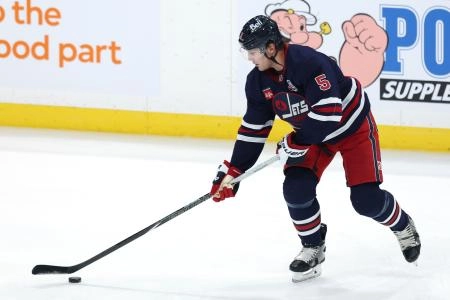 Winnipeg Jets defenseman Luke Schenn participating in pregame warmups ahead of their contest against the Dallas Stars.