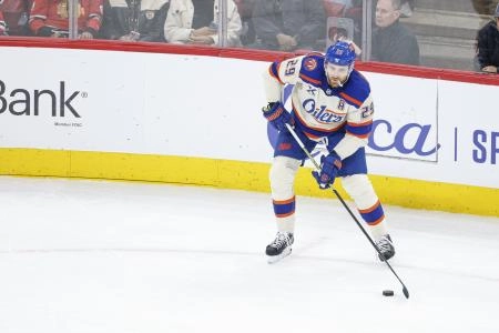 Jan 12, 2026; Chicago, Illinois, USA; Edmonton Oilers center Leon Draisaitl (29) looks to pass the puck against the Chicago Blackhawks during the second period at United Center.