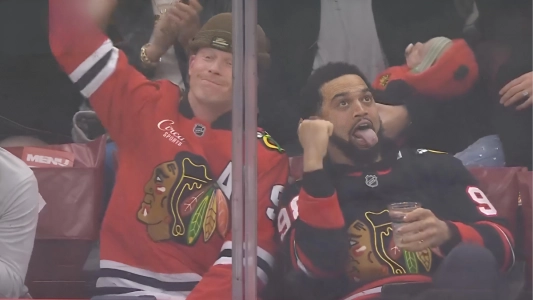 Chicago Bears Caleb Williams and Pete Crow Armstrong at Chicago Blackhawks game