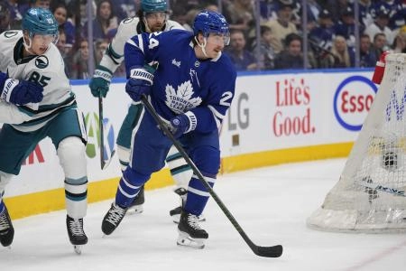 Mar 3, 2025; Toronto, Ontario, CAN; Toronto Maple Leafs forward Connor Dewar (24) skates against the San Jose Sharks during the first period at Scotiabank Arena. Mandatory Credit: John E. Sokolowski-Imagn Images