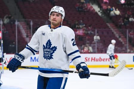 Sep 25, 2025; Montreal, Quebec, CAN; Toronto Maple Leafs forward Jacob Quillan (26) looks on during warm-up before the game against the Montreal Canadiens at Bell Centre. Mandatory Credit: David Kirouac-Imagn Images