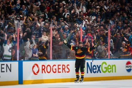 Oct 9, 2025; Vancouver, British Columbia, CAN; Vancouver Canucks forward Filip Chytil (72) celebrates his first goal of the period against the Calgary Flames in the third period at Rogers Arena.