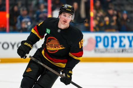Jan 19, 2026; Vancouver, British Columbia, CAN; Vancouver Canucks forward Drew O'Connor (18) skates in warm up prior to a game against the New York Islanders at Rogers Arena.