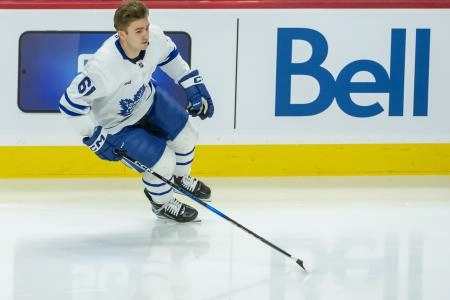 Jan 25, 2025; Ottawa, Ontario, CAN; Toronto Maple Leafs center Jacob Quillan (61) skates on his own during warmup prior to his first NHL game to be played against Ottawa Senators at the Canadian Tire Centre. Mandatory Credit: Marc DesRosiers-Imagn Images