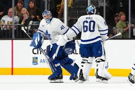 Mar 5, 2025; Las Vegas, Nevada, USA; Toronto Maple Leafs goaltender Joseph Woll (60) is pulled for Toronto Maple Leafs goaltender Anthony Stolarz (41) after surrendering three goals to the Vegas Golden Knights during the first period at T-Mobile Arena. Mandatory Credit: Stephen R. Sylvanie-Imagn Images
