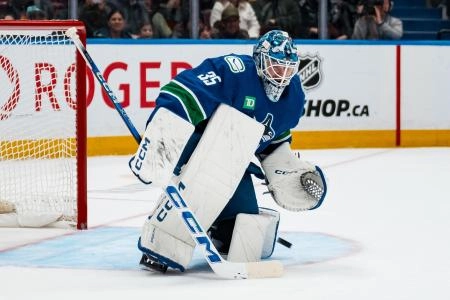 Jan 2, 2026; Vancouver, British Columbia, CAN; Vancouver Canucks goalie Thatcher Demko (35) makes a save against the Seattle Kraken in overtime at Rogers Arena.