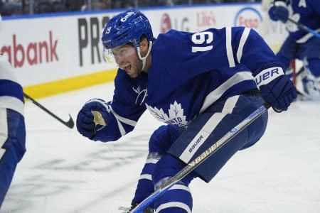 Dec 8, 2025; Toronto, Ontario, CAN; Toronto Maple Leafs forward Calle Jarnkrok (19) pursues th eplay against the Tampa Bay Lightning during the second period at Scotiabank Arena. Mandatory Credit: John E. Sokolowski-Imagn Images
