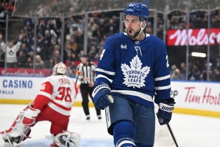 Jan 21, 2026; Toronto, Ontario, CAN; Toronto Maple Leafs forward Scott Laughton (24) celebrates after scoring a goal against Detroit Red Wings goalie John Gibson (36) in the first period at Scotiabank Arena. Mandatory Credit: Dan Hamilton-Imagn Images