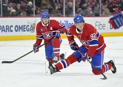 Mar 3, 2025; Montreal, Quebec, CAN; Montreal Canadiens forward Brendan Gallagher (11) and teammate Montreal Canadiens forward Patrik Laine (92) stretch during the warmup period before the game against the Buffalo Sabres at the Bell Centre. Mandatory Credit: Eric Bolte-Imagn Images