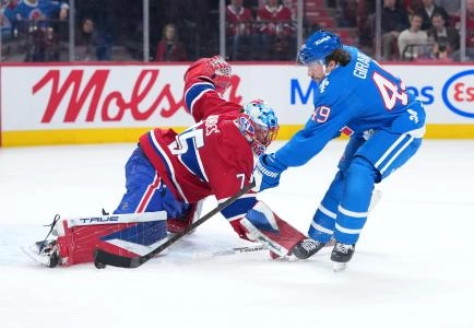 Jan 29, 2026; Montreal, Quebec, CAN; Montreal Canadiens goalie Jakub Dobes (75) stops Colorado Avalanche defenseman Samuel Girard (49) during the second period at the Bell Centre.
