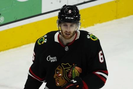 Nov 28, 2025; Chicago, Illinois, USA; Headshot of Chicago Blackhawks defenseman Sam Rinzel (6) against the Nashville Predators during the second period at United Center.