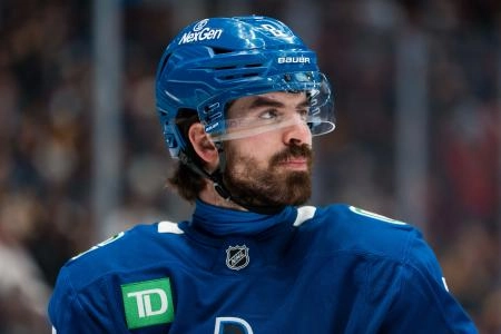 Jan 25, 2026; Vancouver, British Columbia, CAN; Vancouver Canucks forward Conor Garland (8) during a stop in play against the Pittsburgh Penguins in the third period at Rogers Arena.