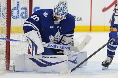 Jan 27, 2026; Toronto, Ontario, CAN; Toronto Maple Leafs goaltender Joseph Woll (60) makes a save against the Buffalo Sabres during the second period at Scotiabank Arena. Mandatory Credit: John E. Sokolowski-Imagn Images