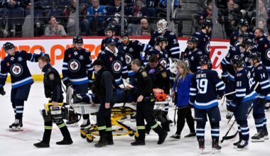 Jets D Fleury alert, moving extremities after taken off ice on stretcher after collision with boards | Pro National Sports