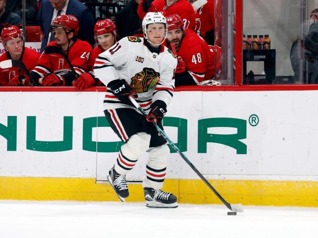 Oliver Moore scores in shootout on 21st birthday, leads Blackhawks to 4-3 win over Hurricanes :: WRALSportsFan.com