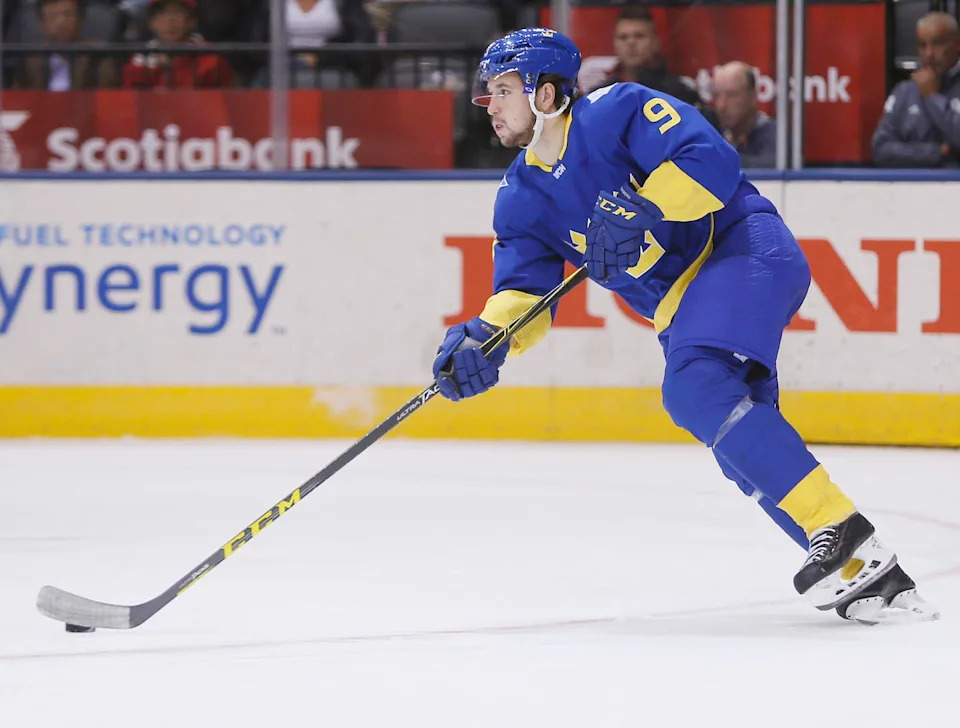 Sep 25, 2016; Toronto, Ontario, Canada; Team Sweden forward Filip Forsberg (9) carries the puck against Team Europe during a semifinal game in the 2016 World Cup of Hockey at Air Canada Centre. Team Europe defeated Team Sweden 3-2 in overtime. Mandatory Credit: John E. Sokolowski-Imagn Images