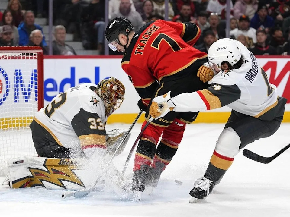  The Ottawa Senators’ Brady Tkachuk looks for the rebound in front of Vegas Golden Knights goaltender Adin Hill as Rasmus Andersson defends during the second period in Ottawa on Sunday, Jan. 25, 2026.